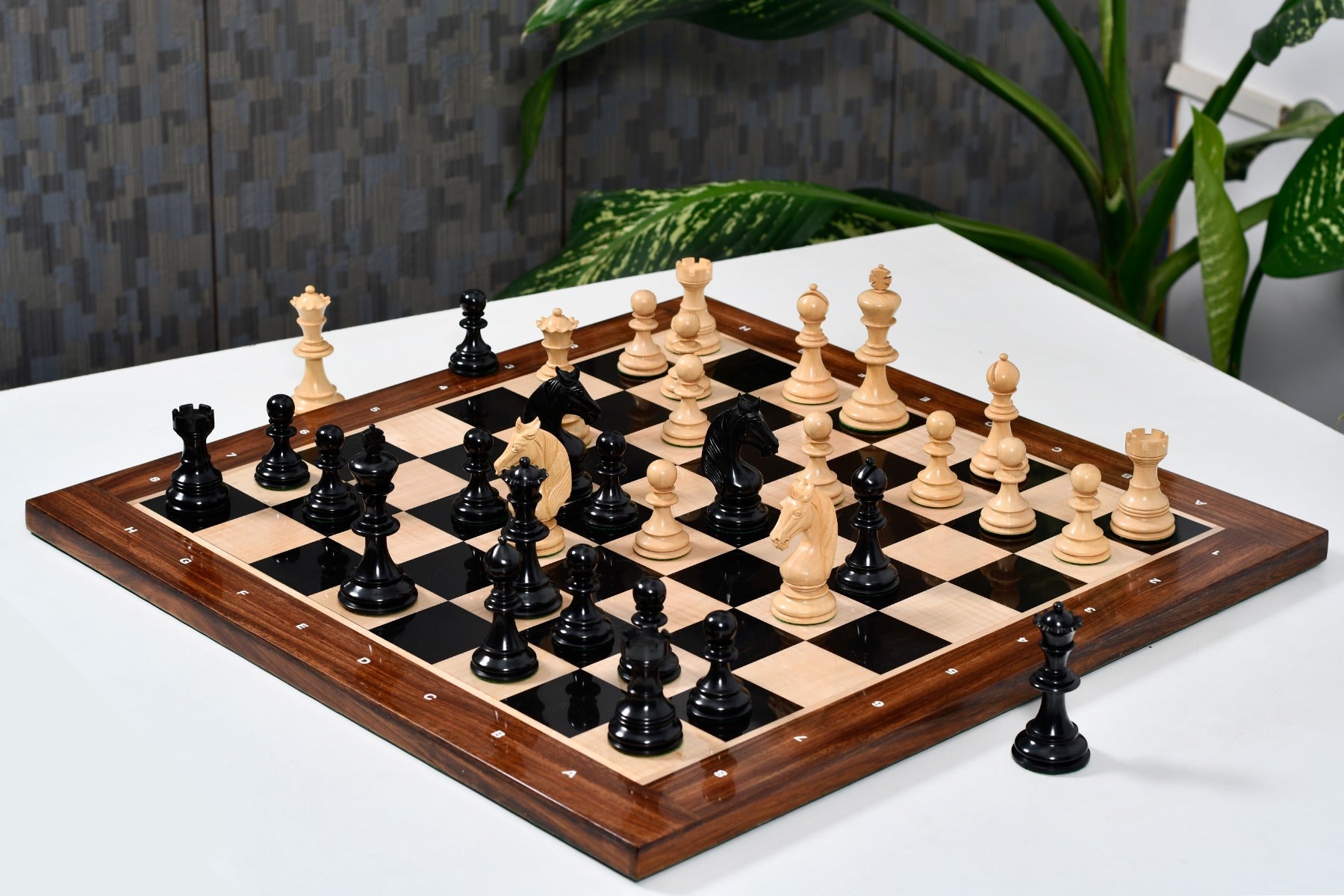 Knight carving detail on the Monarch's Gambit chess pieces in ebony and boxwood