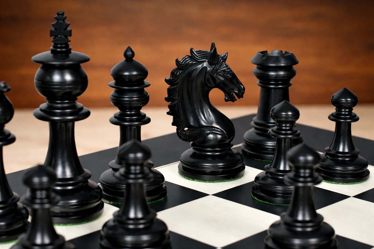 Knight carving detail on the Artisan Knight chess pieces in ebony and natural boxwood