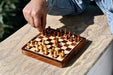 Travel folding magnetic chess set in sheesham and maple, 7 inch board