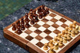 Seven inch folding travel chess set opened flat for play