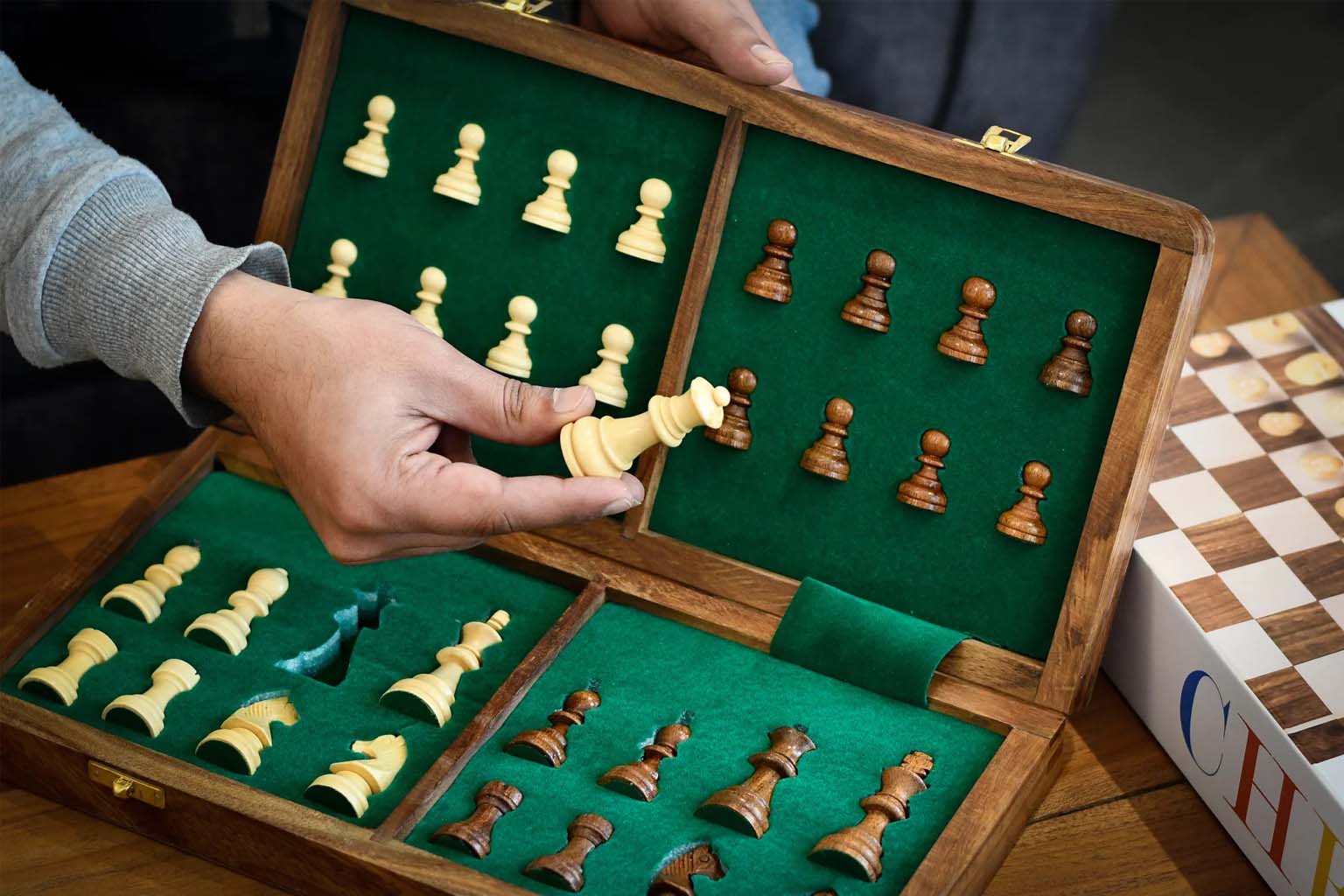 Travel Series 35cm folding magnetic chess board with slots for the pieces