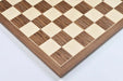 Walnut and maple chess board photographed from above