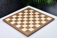 Walnut and maple 60mm square chess board at an angle