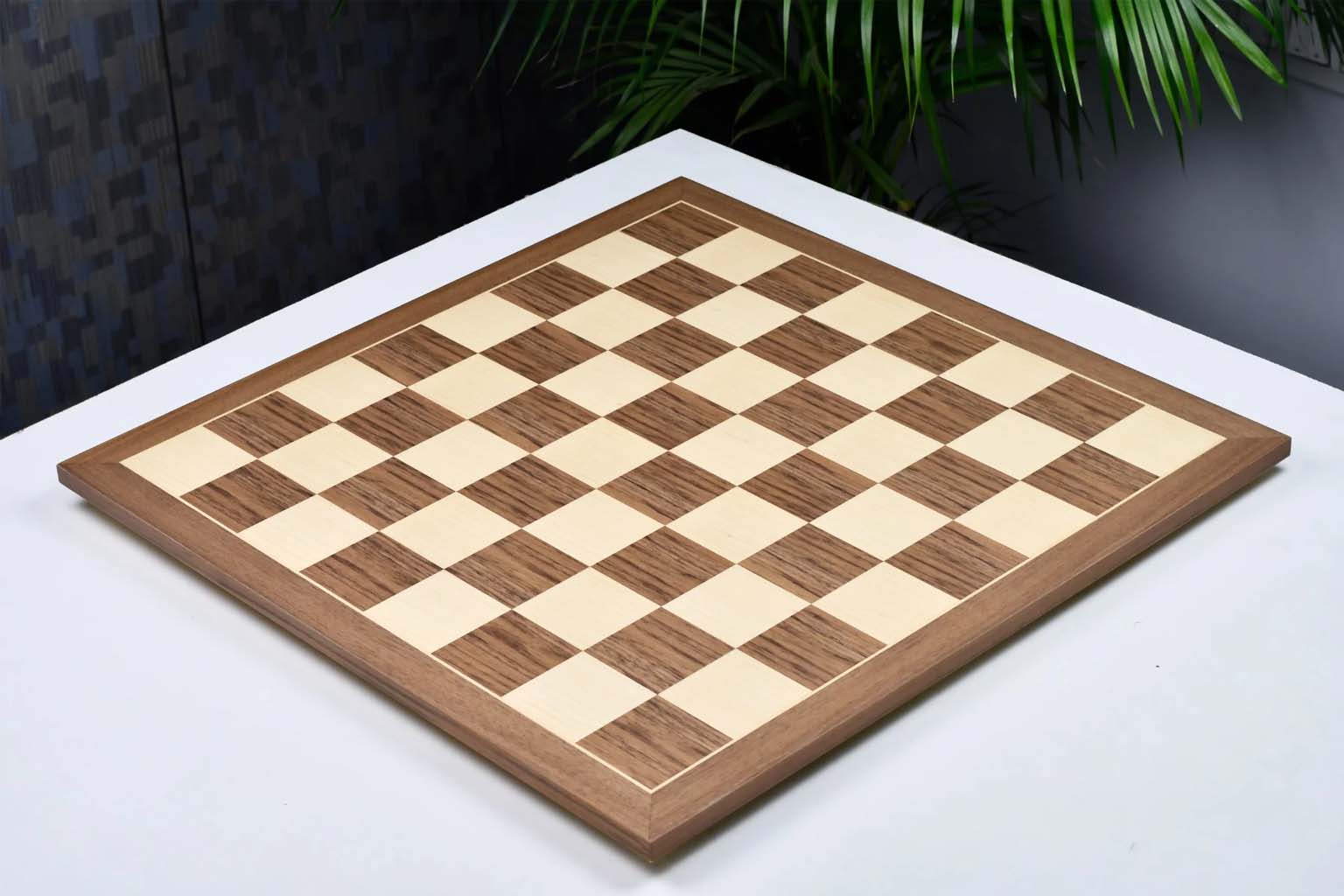Walnut and maple 60mm square chess board at an angle