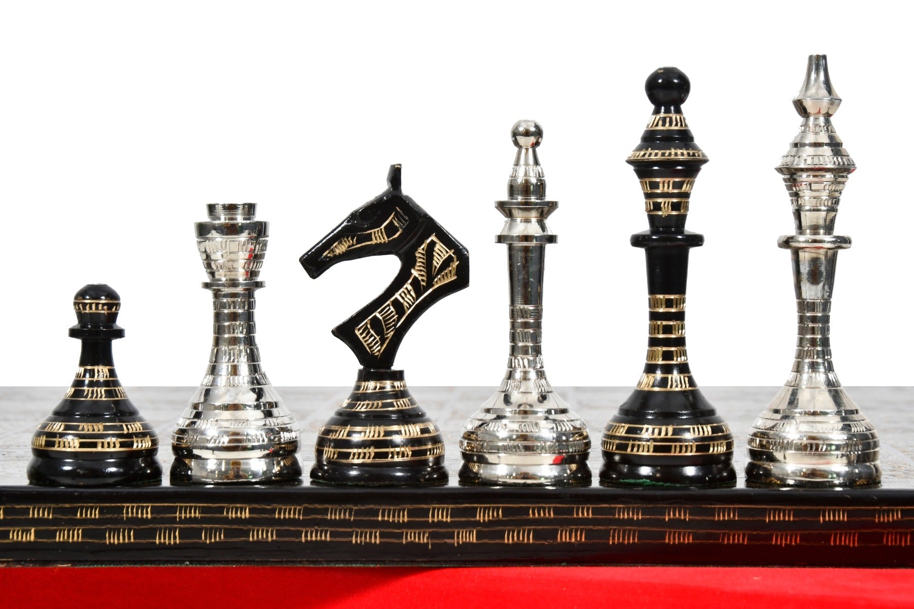 Shiny silver and black brass chess pieces, 3.7 inch king, with board