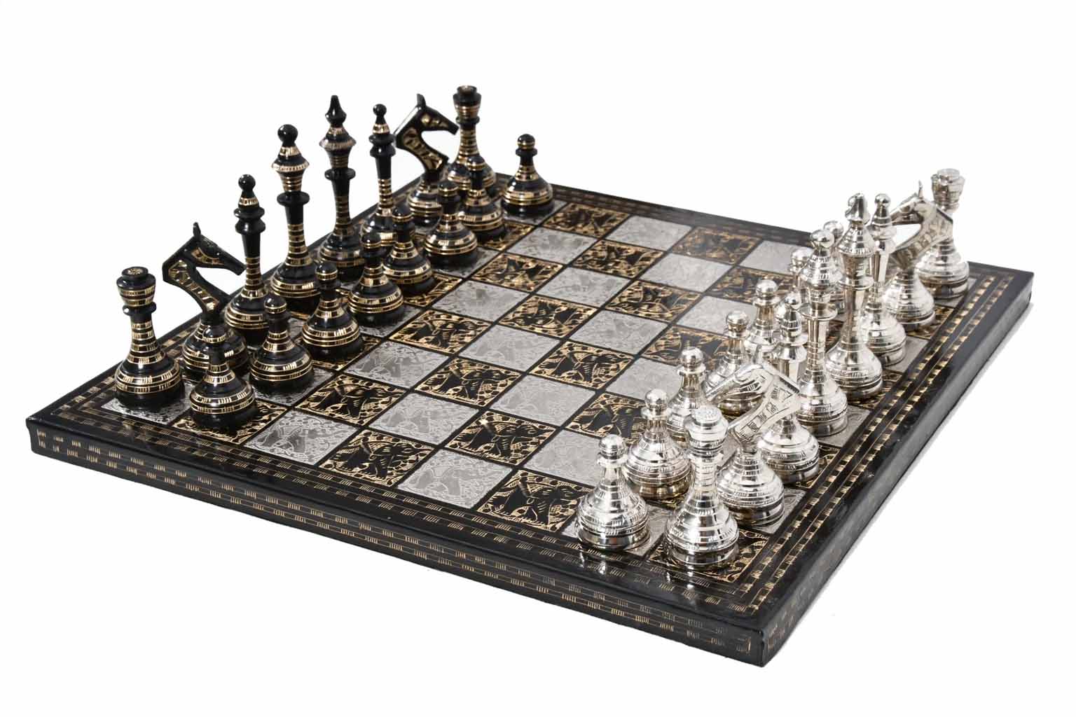 Silver and black brass Staunton chess pieces on 40mm squares
