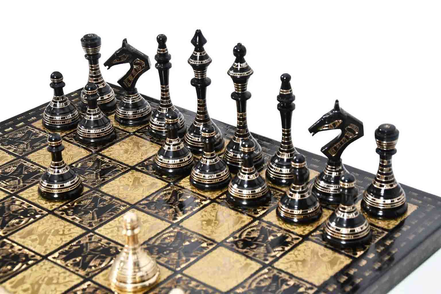 Shiny gold and black brass chess pieces, 3.7 inch king, with board