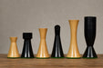 Sterling Chess Minimalist Midnight chess pieces in ebonised and natural boxwood, 85mm king