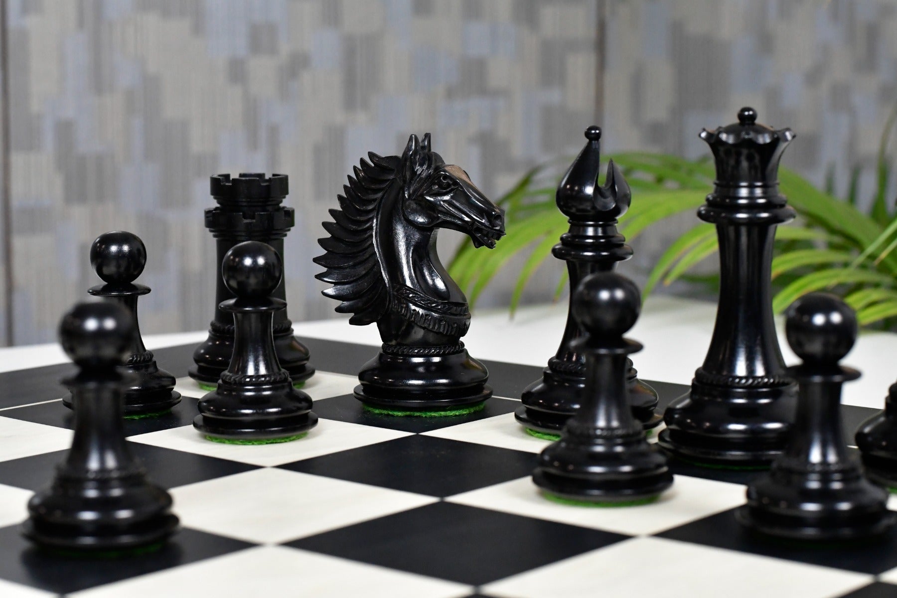 Ebony and boxwood Mustang chess pieces, 113mm king on a 49mm base