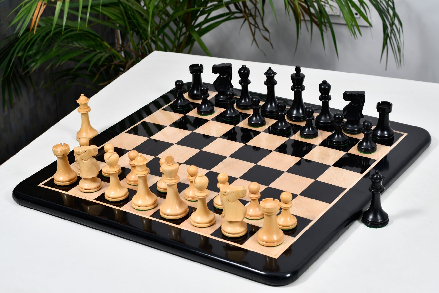 Knight carving detail on the Old Vintage English chess pieces in ebonised and natural boxwood