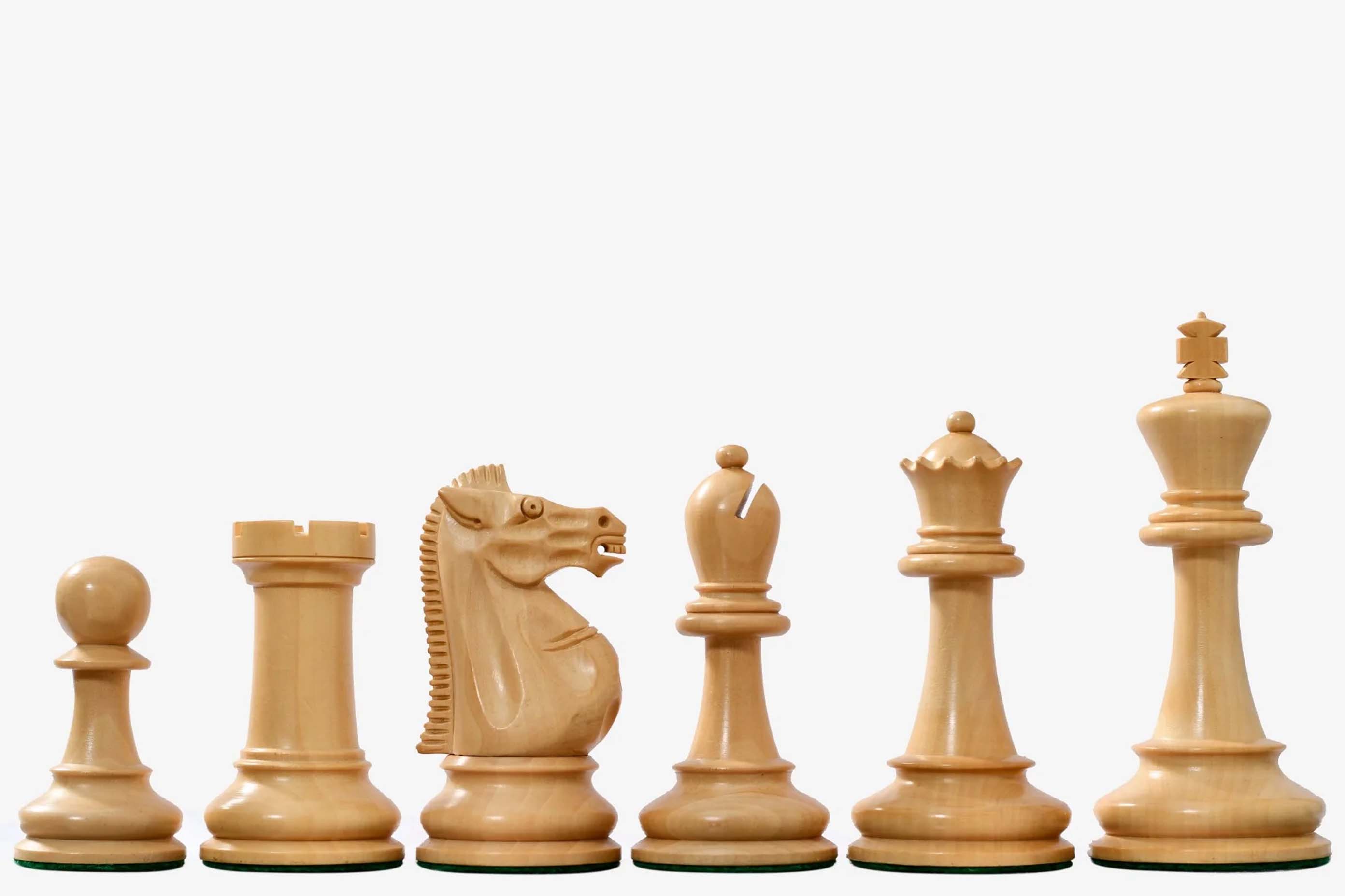 Ebonised chess pieces with a 99mm king and weighted felted bases