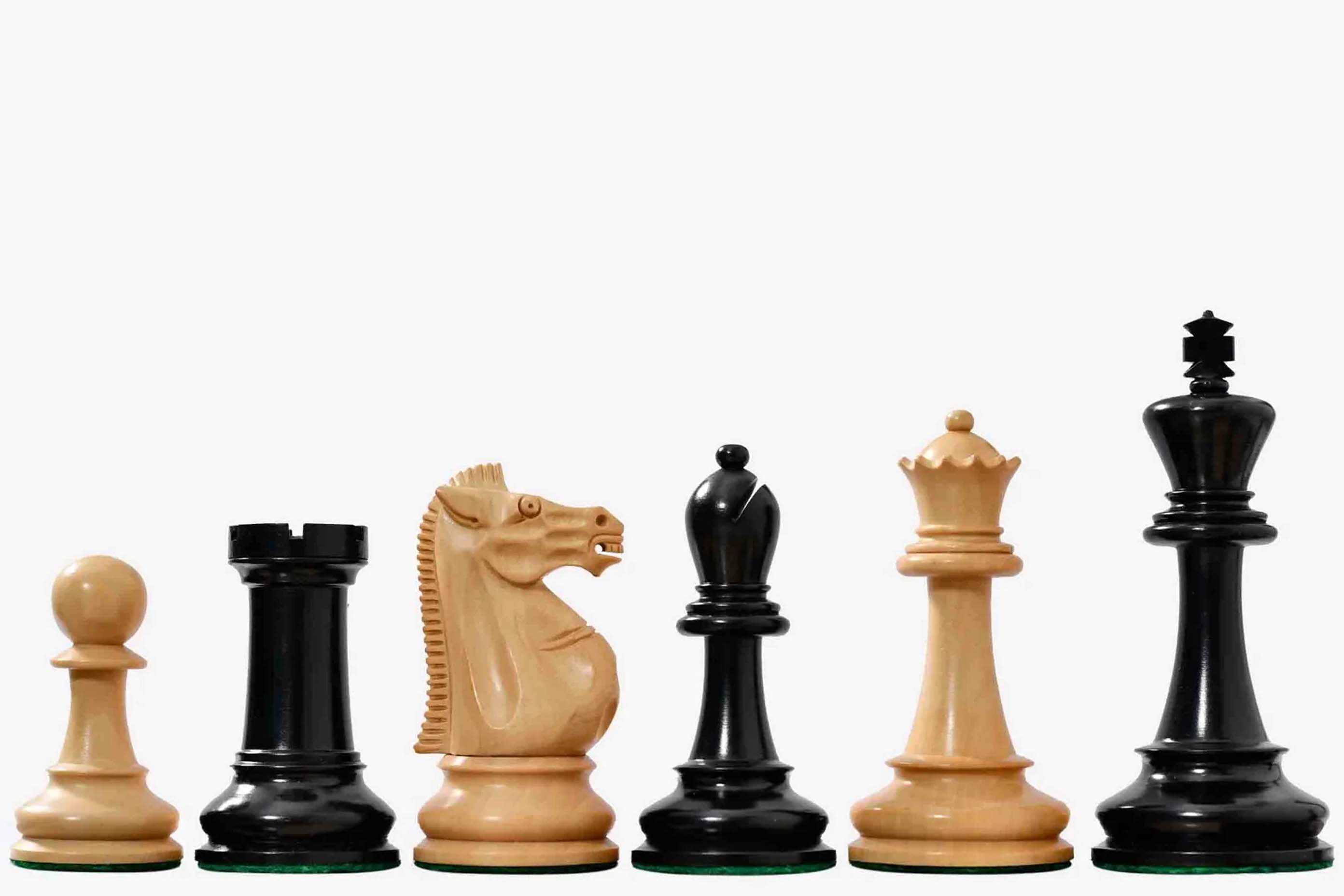 Sterling Chess 1966 17th Chess Olympiad chess pieces in ebonised and natural boxwood, 99mm king