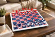 Captain America weighted chess set in red and blue solid plastic with board