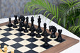 Ebony and boxwood Pegasus Artisan chess pieces, 118mm king, with the 60cm black dyed poplar and sycamore board