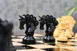 Knight carving detail on the Pegasus Series Artisan Staunton chess pieces in genuine ebony and boxwood