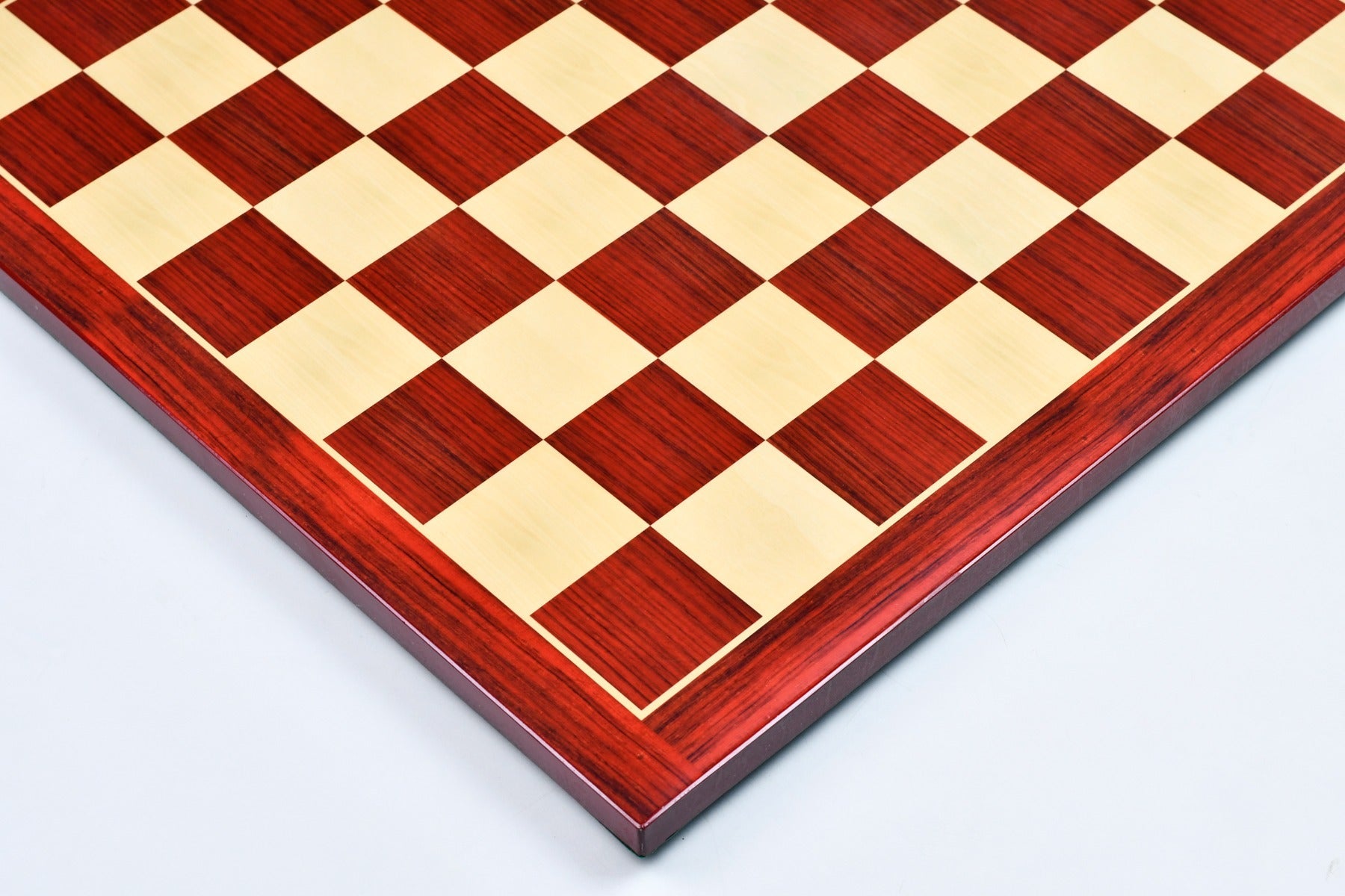 Rosewood grain tournament chess board photographed from above
