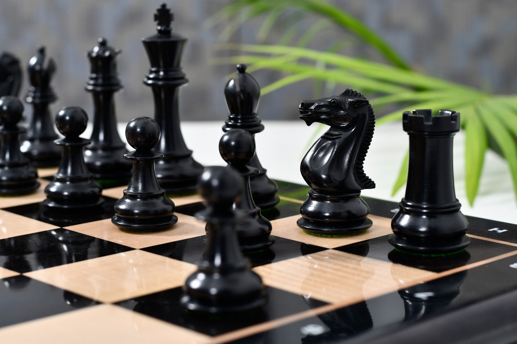 Genuine ebony chess pieces with a 95mm king and weighted felted bases