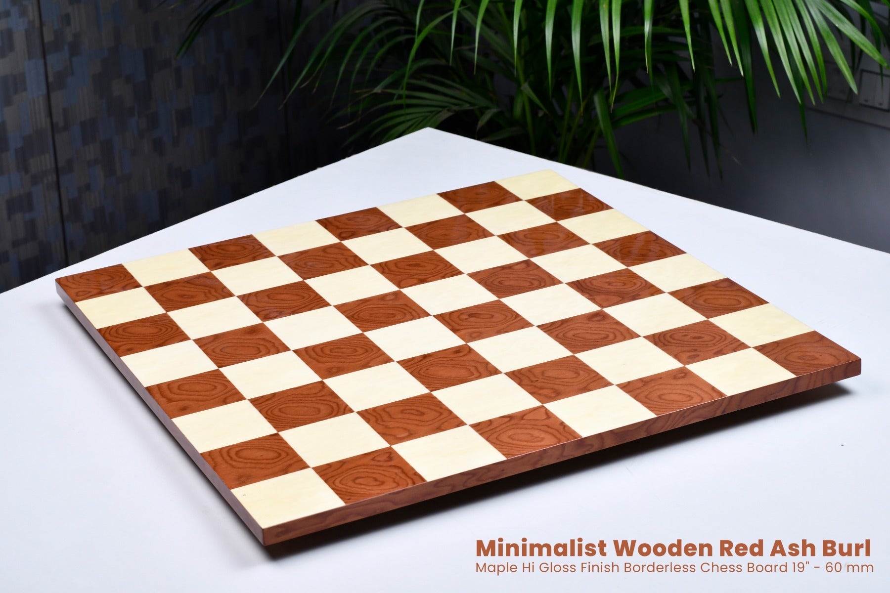 Hi-gloss borderless red ash burl chess board, edge view