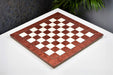 Red ash burl veneer chess board at 45mm squares, close grain detail