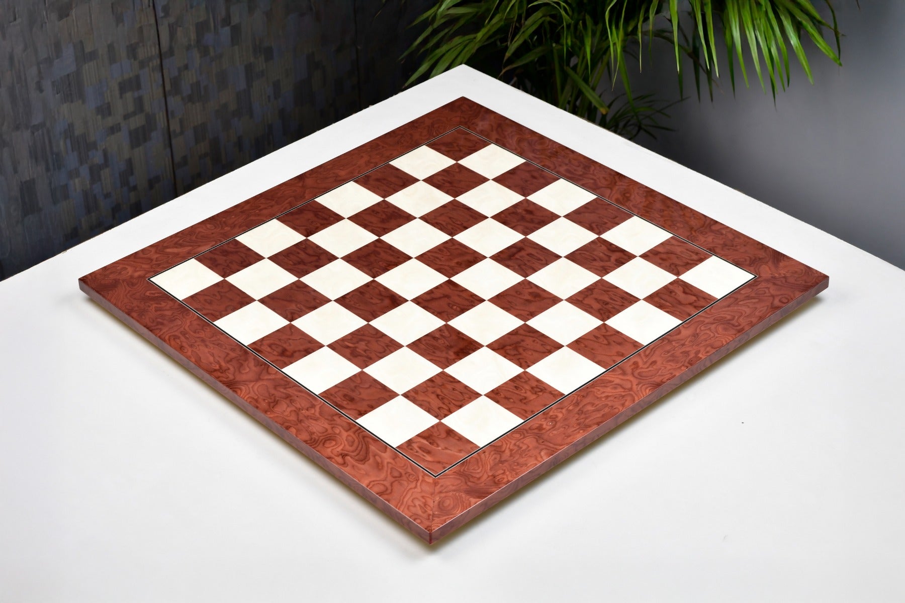 Red ash burl veneer chess board at 45mm squares, close grain detail