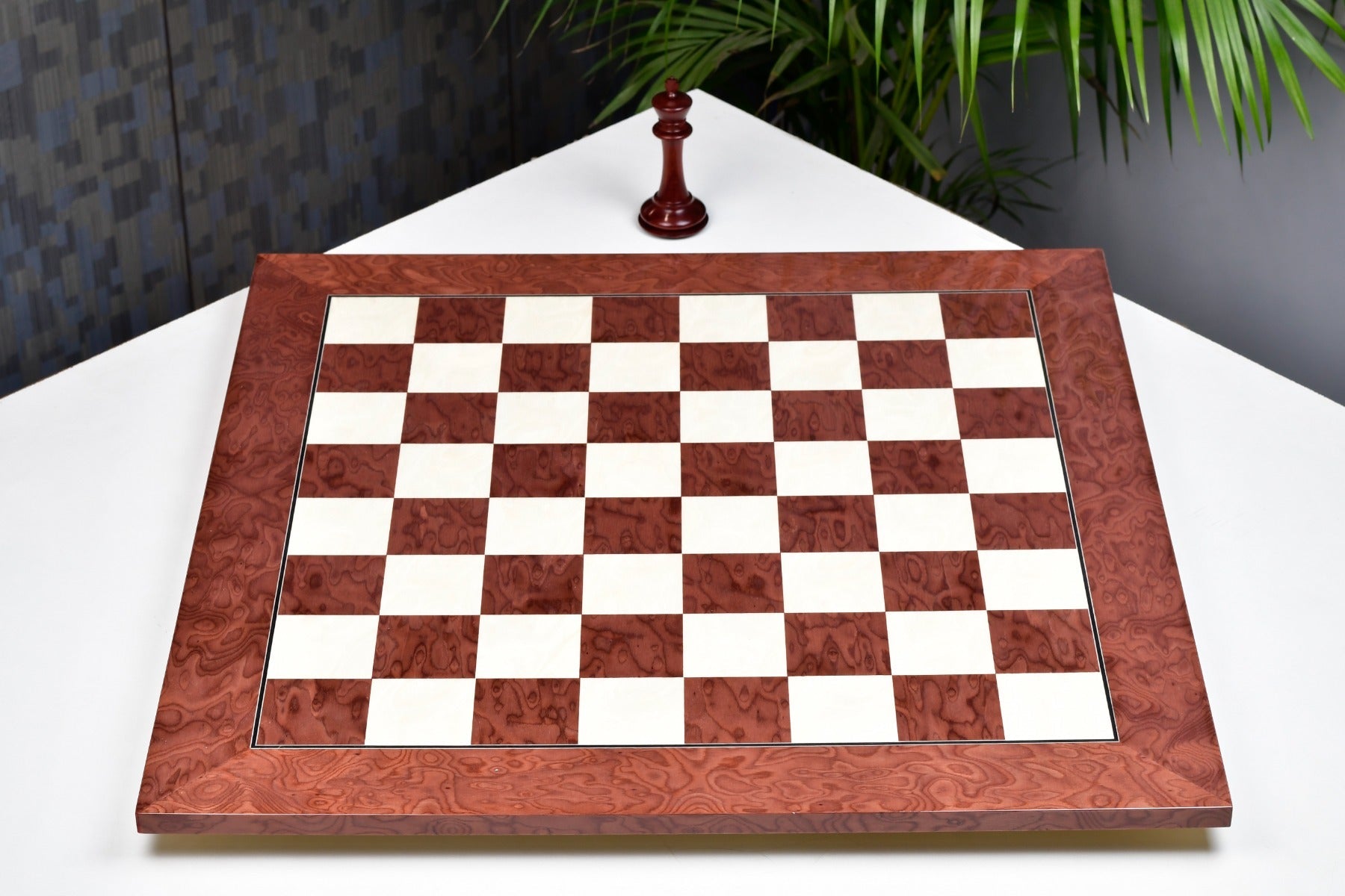 Red ash burl and maple 45cm chess board at an angle