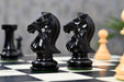 Noble Bridle Series chess set with two spare queens in ebony and boxwood