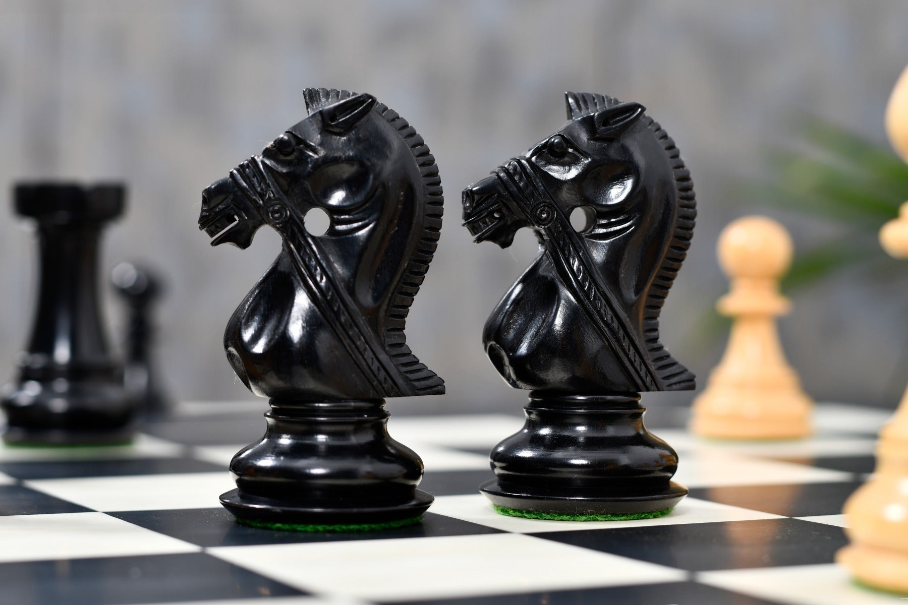Noble Bridle Series chess set with two spare queens in ebony and boxwood
