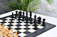 Noble Bridle ebony chess set arranged on 60mm squares