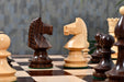 Knight carving detail on the Romanian Hungarian National Tournament chess pieces in rosewood and natural boxwood