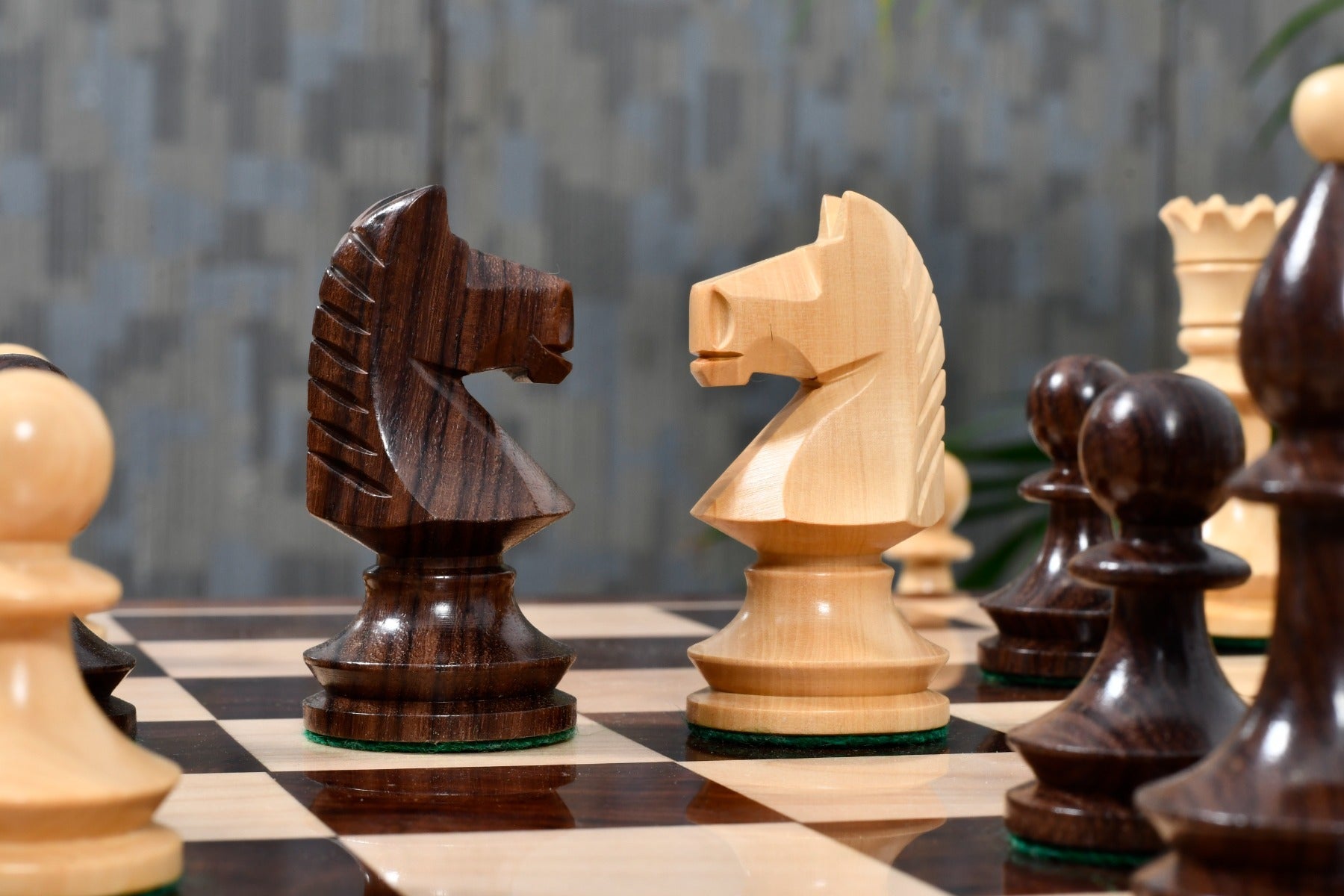 Knight carving detail on the Romanian Hungarian National Tournament chess pieces in rosewood and natural boxwood