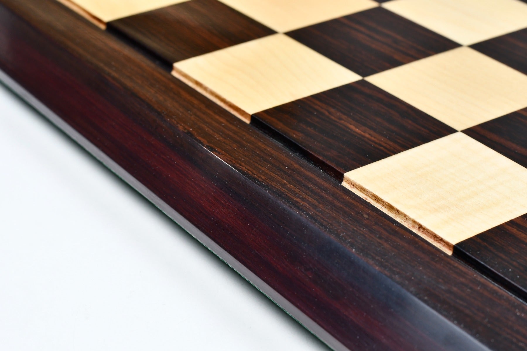 Hi-gloss Indian rosewood and maple chess board showing its 22.9mm thickness