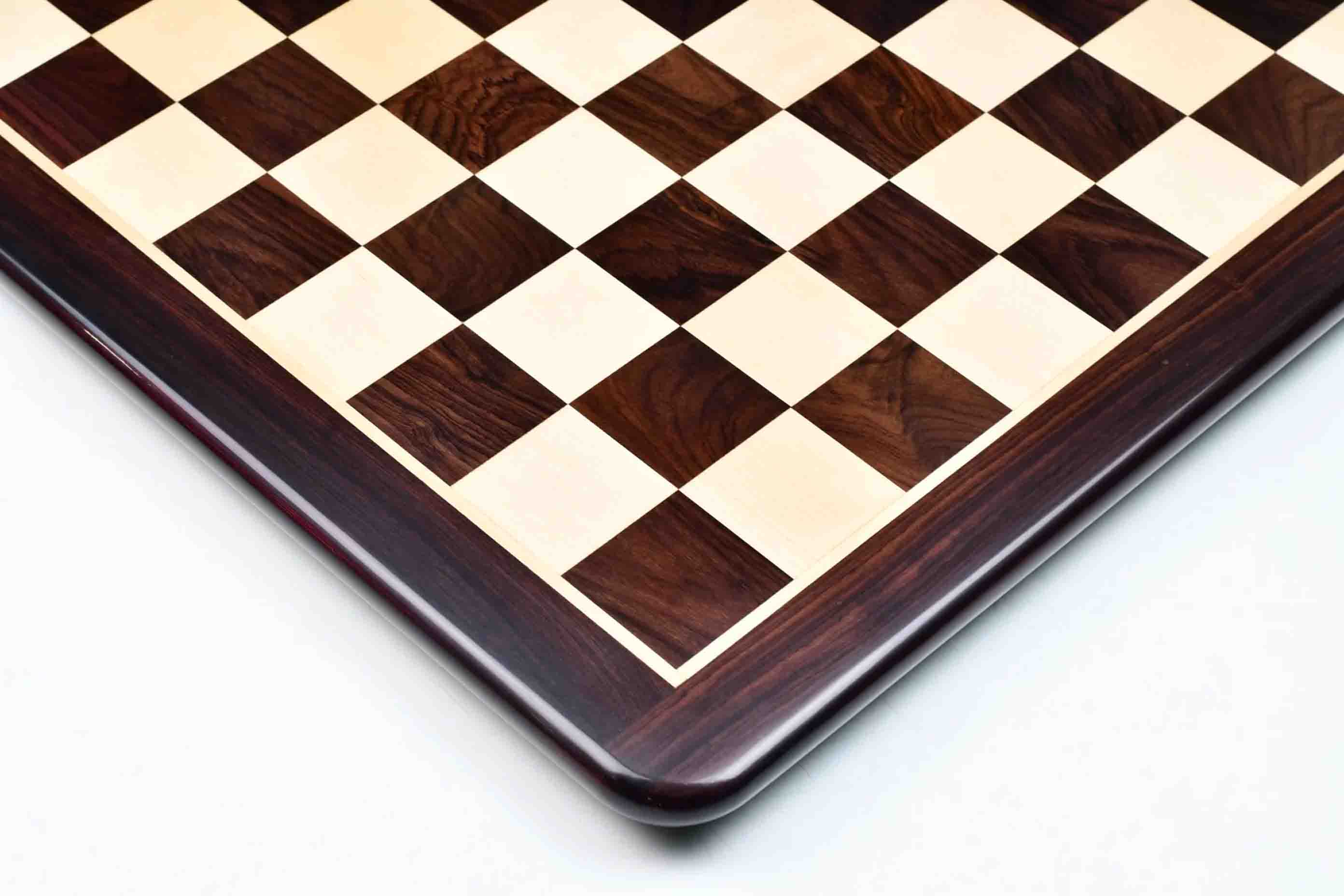 Dark brown Indian rosewood chess board photographed from above