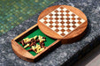 Travel round magnetic chess set in sheesham and maple, 9 inch diameter