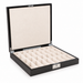 Dal Rossi carbon fibre chess box with the lid open showing the storage compartments