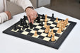 German Knight pattern chess pieces in ebonised boxwood with 96mm king