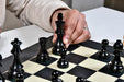 Weighted German Knight boxwood chess pieces with green felt bases, 96mm king