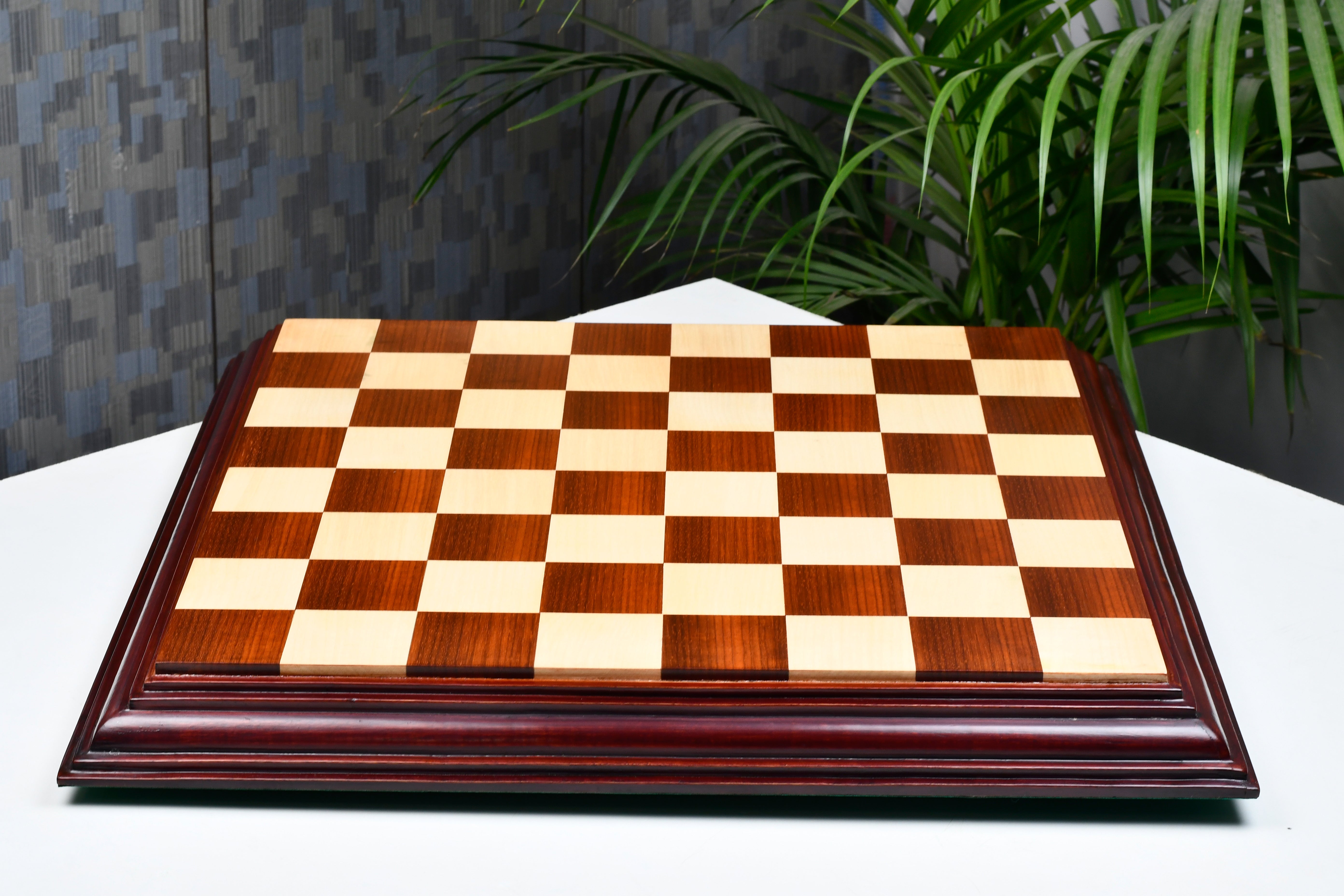 Bud rosewood and maple luxury chess board photographed from above