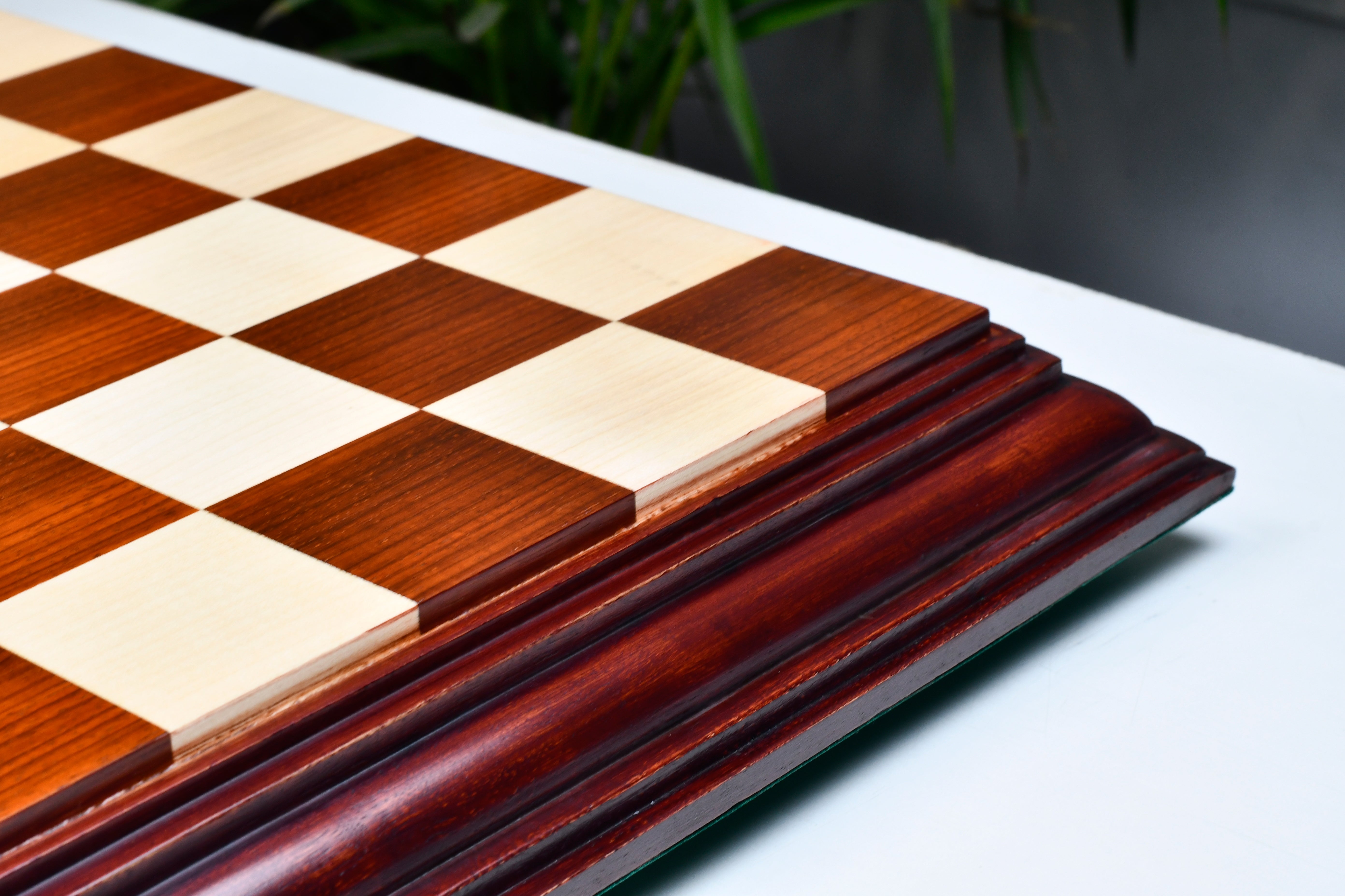 Luxury bud rosewood and maple chess board at an angle