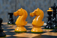 Full Old Vienna V2.0 chess set with its 55cm black dyed poplar and olive board, from Sterling Chess