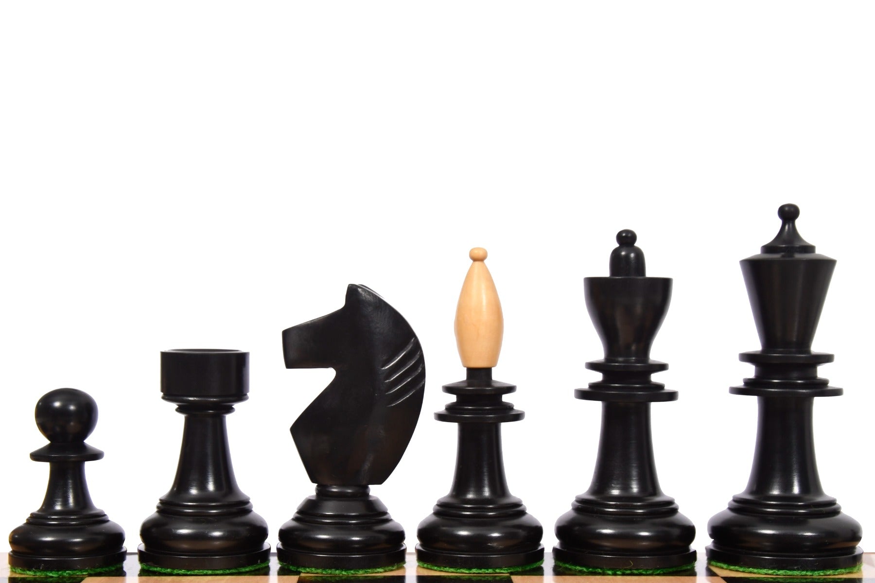 Reproduced Hungarian chess pieces, ebonised and natural boxwood, hand carved in India