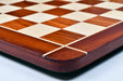 Rounded edge bud rosewood and maple chess board photographed from above