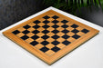 Olive veneer chess board, close detail of the grain